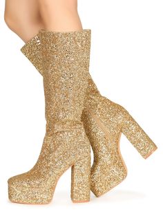 Vegan leather upper with man made sole Side zipper closure Heel measures approx. 5" H Platform measures approx. 1.75" H Imported Gold Platform Boots, Golden Boots, Gold Boots, Gold Platforms, Yellow Boots, Fashionable Shoes, Love Band, Golden Glitter, Cozy Fits