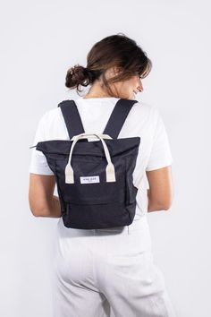 Enjoy everything you love about our classic Hackney Backpacks in a smaller size. Made from 100% recycled materials, our Mini Backpack is perfect for festivals, commutes, and daily use. With smart features like an anti-theft pocket and a key hook, this compact backpack combines style with practicality, making it a chic accessory for any occasion. Small in size, big on function and stylish enough to take anywhere, these bags are the cutest accessory for stashing your essentials on the go! FEATURES Cheap Everyday Backpack With Anti-theft Features, Modern Backpack With Anti-theft Pocket At Affordable Price, Modern Cheap Backpack With Anti-theft Pocket, Cheap Modern Backpack With Anti-theft Pocket, Affordable Functional Backpack With Anti-theft Pocket, Compact Backpack, Sustainable Backpack, Mini Backpacks, Backpack Women