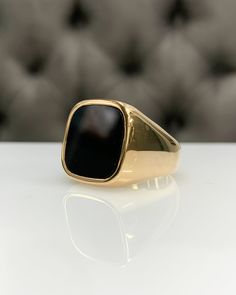 Men Ring with Onyx, Black Pinky Signet Ring, Square Shape Genuine Gemstone, Stylish Gold / Silver Ring, Handmade Jewelry, Best Gift for Him ◎ Details ◎ ○ Material 14K Solid Gold or 925 Sterling Silver Weight of Ring : approx 18.00 gr Height of Ring : approx 5.30 mm ○ Upgrade to Solid 18K Gold, please click the link below: https://www.etsy.com/listing/962826004 ○ Gemstone Natural Onyx Gemstone approx. 15 mm x 15 mm 4.23 ct Made to Order HANDMADE ITEM ○ For Men Collection : https://etsy.me/2PmKJMW Classic Black Rings With Polished Edges, Luxury Black Tarnish-resistant Ring, Formal Onyx Rings With Polished Finish, Timeless Jewelry Ring With Large Stone, Timeless Jewelry With Large Stone, Timeless Large Stone Ring Jewelry, Timeless Onyx Gemstone Rings, Timeless Black Signet Ring With Gemstone, Classic Onyx Ring Jewelry