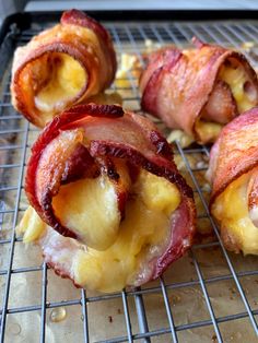 bacon wrapped in cheese on a baking rack