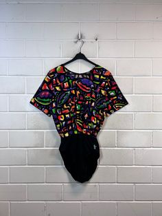 Vintage Body Women's Size L/XL crazy pattern Made in West Germany 80s 90s Vintage bodysuit for women in size L/XL, made of 100% cotton, short sleeves, the fabric is stretchy Colour: black colourful patterned Defects: none Dimensions: Length 81cm Armpit to armpit 56 cm If you have any questions, just write to me :) Vintage Bodysuit, West Germany, Womens Bodysuit, Catsuit, 90s Vintage, Pattern Making, Art Collection, Bathing Beauties, Short Sleeves