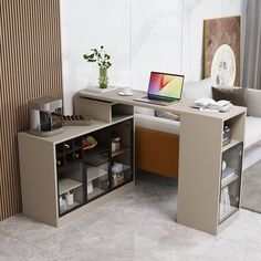 a computer desk in the corner of a living room