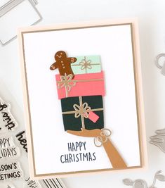 a handmade christmas card with a ginger in a gift box