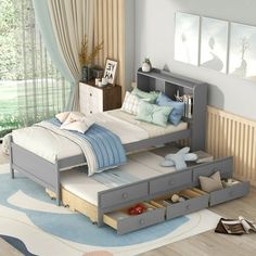 a child's bedroom with a bed, dresser and bookshelf in it