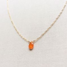 "This Carnelian necklace is made of genuine high quality faceted Carnelian. There are gold filled ,sterling silver and 14kt gold chain you can choose from. There are 2 sizes that you can choose from 16\" or 18\" in gold filled, sterling silver or 14k gold. This tiny carnelian necklace is light weight and elegant. The Carnelian jewelry stone is around 1.5 carats. This tiny carnelian necklace is great for layering with other gold necklaces. This orange stone necklace is delicate and perfect to go Gold Carnelian Jewelry With Faceted Beads, Amber Necklaces With Faceted Beads For Gift, Amber Faceted Beads Necklace For Gift, Amber Necklace With Faceted Beads For Gift, Orange Faceted Jewelry Gift, Gift Carnelian Crystal Necklace In Orange, Orange Carnelian Crystal Necklace As Gift, Orange Carnelian Crystal Necklace For Gift, Orange Carnelian Crystal Necklace Gift