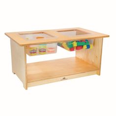 a wooden table with two bins on top and plastic containers in the bottom drawer