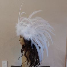 This is a custom "made to Order" listing for a full all white feather headdress. All white feather tones with feather side plumes and and a front feather plume on a bendable pose-able white vine covered wire crown.  SIZE: Side feather plumes will measure around 16''x 12'' and the front feather panel will measure around 7''x 11''. CREATION TIME: Please allow 2-3 weeks for creation time before shipping. I will update you on the progress of your custom order as it is created and provide pictures when it is finished. Headdress will have slight differences from the pictures each headdress is created by hand each time and all feathers are different in nature so they will not be an exact copy. SHIPPING: Headdress will be shipped with USPS priority 1-4 day shipping with insurance and signature con Ostrich Feather Trimmed Costume Hat For Wedding, Adjustable White Headpiece For Carnival, White Ostrich Feather Headpiece With Feather Trim, Adjustable White Feathered Headpiece, White Ostrich Feather Wedding Headpiece, Costume Party Hats With Ostrich Feathers, White Feathered Party Headpieces, Ostrich Feather Trim Hat For Costume Party, Costume Party Hat With Ostrich Feather Trim