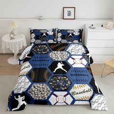 a baseball themed comforter set on a bed