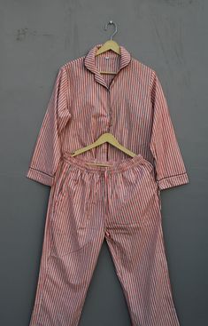 Please MESSAGE us for CUSTOM ORDERS  Pink Floral Cotton Pj Set, Pajama Set Women, Bridesmaid Pajama Set, Women Pj Set, Nightwear, Sleepwear, Bridesmaid Gifts. This pajama is made for a relaxed fit and allows for ease of movement throughout the night. Every piece can be made customized to your desires. These natural women pajamas are made of cotton fabric and perfect for sleep, or for parties, or for everyday use. Payjama set will make you feel stylish while offering incredible comfort. The fabric is breathable to sleep in. With the holiday season just around the corner, it's the perfect time to shop for a set of cozy pajamas for yourself or someone else Fit: Relaxed fit Breathable & comfortable, Cotton Pyjama Set made From Hand block Printed Fabric.It is hand printed fabric using natural d Multicolor Cotton Sleepwear For Lounging, Multicolor Cotton Loungewear Sets, Multicolor Cotton Lounging Sets, Orange Cotton Sleepwear For Loungewear, Multicolor Cotton Sleepwear For Sleepovers, Orange Cotton Sleepwear For Home, Orange Cotton Sleepwear, Multicolor Cotton Pajama Shorts With Relaxed Fit, Orange Long Sleeve Sleepwear