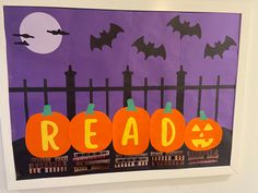 an art project with pumpkins and bats reading read