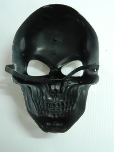 Light weight PVC Mask with elastic head ban for costume fun. Great look, easy on and off for parties. Hand Painted. Adjustable Masks And Prosthetics For Halloween Costume Party, Rave Style Masks And Prosthetics For Halloween, Pirate Style Black Costume Accessories For Cosplay, Black Pirate Costume Accessories For Cosplay, Black Novelty Masks And Prosthetics For Costume, Skull-shaped Costume Accessories For Halloween Masquerade, Adjustable Pirate Costume Accessories For Halloween, Black Skull Mask For Costume, Black Skull Costume Accessories For Cosplay