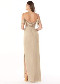 the back of a woman wearing a long dress with one shoulder and side slits