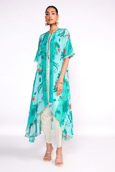 Aqua green crepe front-open kaftan tunic with floral print and cutdana and sequins embroidered placket. Comes with tulip pant and a silk bustier.
Components: 3
Pattern: Printed, Embroidered
Type Of Work: Floral, Cutdana, Sequins
Neckline: Round
Sleeve Type: Half
Fabric: Crepe, Bustier : Silk, Lining : Crepe
Color: Green
Other Details: 
Attached lining
Model Height : 5 ft 8 inches, wearing size S
Closure : Tunic - Front zip
Occasion: Sangeet - Aza Fashions Open Kaftan, Isha Gupta, Tulip Pants, Kaftan Tunic, Floral Print Sarees, Tunic Designs, Floral Print Tunic, Top Skirt Set, Lehenga Saree