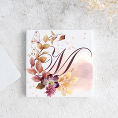 a notepad with watercolor flowers on it