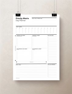 a printable daily planner hanging on a wall