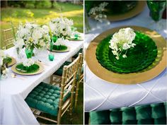 the table is set with green plates and white flowers