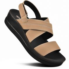 Supreme comfort and style in mind, Dione ankle strap platform sandals are the perfect addition to your warm-weather wardrobe. Featuring an open toe design and cross strap, these sandals effortlessly complement playful dresses. With a soft cushioned lining, arch support, and water-friendly gel soles, they offer a comfortable and durable option for beach vacations, errands, and everyday casual walks. The adjustable ankle strap ensures a secure fit, while the platform wedge adds a touch of elegance Tan Sandals, Trending Sandals, Womens Sandals Wedges, Round Toe Heels, Sandals For Women, Womens Wedges, Comfortable Sandals, Toe Designs, Cross Straps