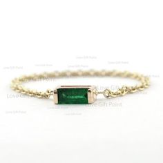 DescriptionGenuine 0.13 Ct. Baguette Cut Zambia Emerald Gemstone Chain Ring in Solid 14K Yellow Gold Emerald Wedding Ring Minimalist Jewelry Gift≫ Features• Items Code: SGR01608 • Metal: 14K Solid Gold (18K also available - Additional fees may apply)• Solid 14K Yellow Gold with stamped• More option in gold color: Rose gold, yellow gold, White gold• Emerald Gemstone:- 0.13 Ct.• Ring Size :-  2 to 10≫ FAQ below for more detail.✦ For International Buyer - Customs and import taxes................... Minimalist 14k Gold Emerald Cut Jewelry, Emerald Cut Baguette Diamonds May Birthstone Jewelry, Emerald Cut Baguette Diamond Jewelry For May Birthstone, Minimalist 14k Gold Baguette-cut Jewelry, Minimalist Stackable Jewelry With Emerald Cut, Minimalist 14k Gold Baguette Cut Jewelry, Minimalist 14k Gold Jewelry With Baguette Cut, Minimalist Baguette Diamond Cut Jewelry, Dainty Yellow Gold Baguette Jewelry