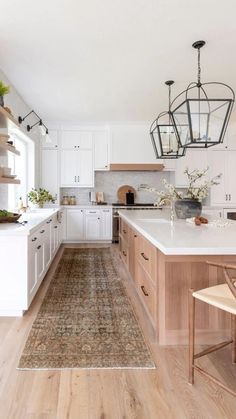 the kitchen is clean and ready to be used for cooking or dining, but it's not too far from the living room