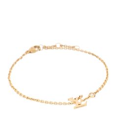 This is an authentic LOUIS VUITTON 18K Yellow Gold Diamond Idylle Blossom LV Bracelet. The bracelet is crafted of 18 karat yellow gold and features the iconic LV logo and a single bezel set round brilliant cut diamond, approximately .02 carat. Lv Bracelet, Louis Vuitton Bracelet, Lv Logo, Round Brilliant Cut Diamond, Brilliant Cut Diamond, Bezel Setting, Authentic Louis Vuitton, Round Brilliant, Womens Bracelets