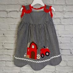 Gingham Farm Animals Dress ~~ Red Shoulder Button ~~ By: Everlasting Heirloom Adorable Black & White Checker Pattern Dress Featuring Red Accent Trim And Buttons. Stunning Embroidery Stitching With The Barn, Tractor, And Farm Animal's Adds Tons Of Charm And Character To This Sweet Little Dress. Tagless Fully Lined Eyelet Detailing Button Shoulders Embroidered Stitching 100 % Cotton Original ' Heirloom Baby Collection' " Handstitched With Love " Rn # 161110 00887800 Hls _ 876 This Is A Brand New I Cute Gingham Dresses For School, Cute Gingham School Dress, Playful Gingham Dress For Playtime, Plaid Cotton Dress For Playtime, Yellow Baby Dress, Red Formal Dresses, Bronze Dress, Pink Sweater Dress, Frozen Dress