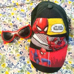 Nwot!!! These Red And Black Spiderman Glasses Are Designed For A Young Girl. The Design Is Classic But With Upward Turned Front Top Corners. They Also Come With A Matching Hat That Says, "This Looks Like A Job For Spiderman!" These Could Be Cute To Wear With A Matching Outfit For A Fan. Also, If Your Taking Your Kid To Universal Studios, Where They Have The Spiderman Ride And Character Actors They Can Meet. There Is No Name, Company Or Numbers Printed Anywhere On Them. Spiderman Young Girl Red B Red Adjustable Themed Hat, Black Cap For School, Red Themed Cap Hat, Themed Red Cap, Fun Black Visor Hat, Themed Red Hat One Size Fits Most, Novelty Red Baseball Cap One Size, Fun Black Baseball Cap For Outdoor, Fun Baseball Cap With Uv Protection