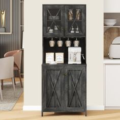 a black hutch sitting in the corner of a room