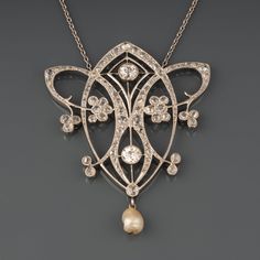 A very beautiful antique pendant necklace, made circa 1900. Made in platinum and set with Old European cut and rose cut diamonds. The bigger diamonds weights 0.40 carats each approximately. The necklace length is 42 cm. The pearl is probably a natural sea pearl. Dimensions: 55 mm height and 42 mm width Weight: 11.86 grams Pearl Art, Art Nouveau Pendant, French Jewelry, Art Deco Diamond Rings, Big Diamond, Antique Pendant, Art Nouveau Design, Antique Earrings, Vintage Jewels