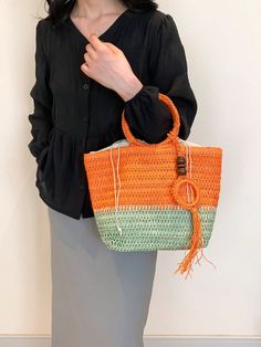 Stay stylish and organized this spring and summer with our Chic and Colorful Woven Tote Bag. Featuring a circular handle design and vibrant colors, this bag is perfect for any occasion. With ample space and a durable woven construction, it's the ultimate accessory for all your needs. Color : Multicolor Type : Straw Bag Bag Size : Large Style : Casual, Vacation Strap Type : Chain Closure Type : Zipper Pattern Type : All Over Print Composition : 60% Polyester, 40% Polyvinyl Chloride Material : Fab Summer Straw Bag With Detachable Handle, Multicolor Bucket Bag With Adjustable Strap For Spring, Multicolor Bucket Bag For Summer, Multicolor Summer Bucket Bag For Travel, Multicolor Summer Bucket Bag, Eco-friendly Handheld Beach Bag For Summer, Summer Straw Bag With Round Handle For Shopping, Spring Multicolor Bucket Shoulder Bag, Spring Green Bucket Bag With Adjustable Strap