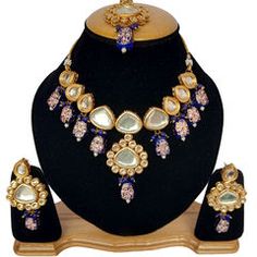 Gold Rodium Polish Blue color Necklace in Metal Alloy studded with Kundan Round Metal Kundan Necklace For Gift, Bollywood Style Brass Kundan Necklace With Tilla, Ceremonial Blue Kundan Necklaces, Elegant Gold Kundan Metal Necklace, Ceremonial Blue Kundan Necklace, Color Necklace, Metal Necklace, Blue Necklace, Metal Necklaces