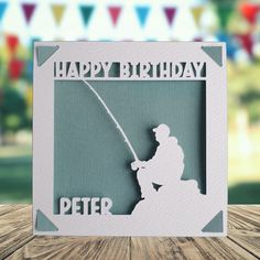 a happy birthday card with a silhouette of a fisherman