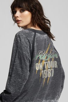 Travel back to the past with this Poison "Talk Dirty to Me" 1987 Tour sweatshirt. This sweatshirt has portraits of each band member on the front and the tour on the back. Made with soft vintage washed fabric, a relaxed crew neckline, ribbed hems, and our comfortable oversized fit. The design of this style is oversized. For a more standard fit, choose a size down. Details Style #302742 Color: Black Poison Talk Dirty To Me 1987 Tour Oversized Sweatshirt 47.5% Cotton 47.5% Polyester 5% Spandex Care Vintage Distressed Acid Wash Sweatshirt, Vintage Acid Wash Distressed Sweatshirt, Vintage Distressed Crew Neck Sweatshirt, Retro Graphic Print Sweatshirt For Concerts, Retro Distressed Tops For Concert, Vintage Washed Black Long Sleeve Tops, Vintage Long Sleeve Washed Black Tops, Vintage Acid Wash Crew Neck Sweatshirt, Vintage Concert T-shirt For Fall