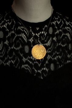 Bohemian Hammered Round Pendant Jewelry, Bohemian Gold Hand Cast Necklace, Gold Moon Phase Necklace For Festivals, Gold Moon Necklace For Festivals, Bohemian Hammered Brass Necklaces, Gold Hammered Copper Necklace, Hammered Gold Copper Necklace, Spiritual Brass Hammered Necklace, Spiritual Hammered Brass Necklace