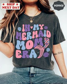 In My Mermaid Mom Era Shirt, Mermaid Mama Shirt, Mermaid Hoodie, Mermaid Mom Party Shirt, Birthday Mom Shirt, Girl Mermaid Shirt ------------- Welcome to our little shop! You will love this trendy garment-dyed t-shirt that is made 100% with ring-spun cotton. The comfort colors soft-washed, garment-dyed fabric brings extra coziness to your wardrobe while the relaxed fit makes it an excellent daily choice. This is a standard unisex size Comfort Colors Tee. For an oversized tee, please size up. If Mermaid Outfit Women Casual, Mermaid Mom Shirt, Mom Party, Mermaid Shirt, Mermaid Outfit, Oversized T Shirt Dress, Birthday Mom, Mom Era, Shirt Girl