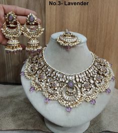 *Light Weight Kundan layered necklace set with earrings and tikka. *Studded with kundan stone. *Light Weight Gold kundan necklace. * Necklace width- 2.5 inches( Included drops) *Earrings Length- 3.4 inches(included pearl drop) *Earrings width Size- 1.5 inches Festive Bollywood Purple Jewelry, Festive Purple Bollywood Jewelry, Purple Kundan Jewelry For Diwali, Purple Kundan Bollywood Jewelry, Purple Kundan Necklace For Gifting, Purple Kundan Necklace Gift, Festive Purple Kundan Necklace, Festive Purple Kundan Jewelry, Festive Purple Chandbali Jewelry