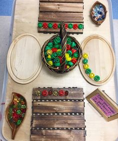 an image of a table with buttons and other items on it, including yarns