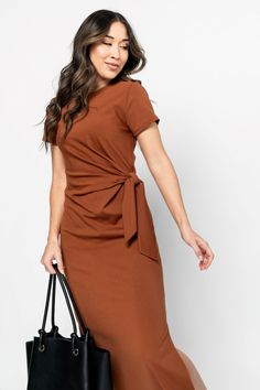 Thicker material w/ stretch Adjustable tie at the waist Midi length Ruched silhouette Fits true to size If between sizes, size up Styled with the Lia Heels Length: approx 49.5" from top of shoulder to front hem SLAY! Our fav sassy dress is back in a new color. This earthy brown is EVERYTHING... *OUT OF STOCK? Select your size & sign up for restock notifications. *Holley is 5'5, wearing a small in the try on video. *Lex is 5’6, wearing a small. //Sizing// Small: Size 2-4 Medium: Size 6-8 Large: Size 10-12 Extra Large: Size 14 Fabric: 67.5% Rayon, 29% Nylon, 3.5% Spandex Wash/Care: Gentle cycle cold, line dry. Tank Top Layering, Sassy Dress, Mule Sneakers, Earthy Brown, Mules Shoes, Up Styles, Try On, Medium Size, Midi Length