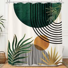 a shower curtain with an abstract design and palm leaves