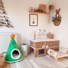 a living room filled with furniture and decor on top of hard wood floored floors