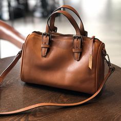 Full Grain Leather Handbag Leather Crossbody Bag Women Leather Shoulder Bag Model Number: T1925 Dimensions: 9"L x 4.3"W x 6.7"H / 23 cm(L) x 11 cm(W) x 17 cm(H) Weight: 1.5 lb / 0.7 kg Hardware: Selected Brass Hardware Shoulder Strap: Adjustable Color: Brown / Black Features: 1. Genuine Natural Leather2. Inside 1 Wallet Pocket, 1 Zipper Pocket3. YKK Zipper4. Adjustable Shoulder Strap5. Can fit Mobile Phone, Wallet. etc. Real Leather Handbags, Handbags Casual, Leather Handbags Women, Handbag Leather, Weekend Bag, Leather Satchel Bag, Leather Handbags Crossbody, Leather Handbags Tote, Crossbody Bag Women