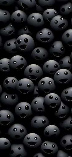 many black balls with faces and eyes are shown in this image, as if they were floating