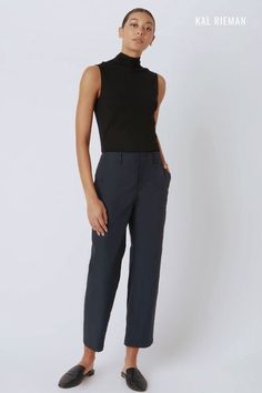 Make the Francoise Cigarette Pant in Navy a cornerstone of your business casual outfit. These navy cigarette pants are a winter must-have, offering comfort and style for your womens work outfits. Embrace the versatility of these pants and create a range of cold weather ensembles. Upgrade your winter capsule wardrobe effortlessly. Workwear Cropped Leg Pants With 4-way Stretch, Fitted Bottoms With Cropped Leg And Seam Detailing, Fitted Bottoms With Seam Detailing And Cropped Leg, Versatile Cropped Leg Business Casual Pants, Versatile Cropped Leg Pants For Business Casual, Fitted Bottoms With Zip Fly And Straight Hem, Casual Cropped Leg Office Pants, Casual Cropped Leg Pants For Office, Casual Cropped Pants For Office