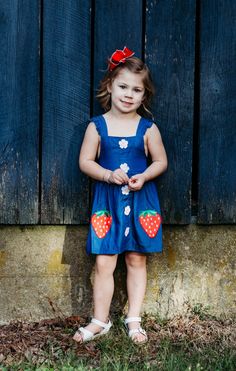 This Strawberry Denim Sundress is perfect for any occasion! With its delicate ruffle shoulder straps and adorable applique strawberry, your little one will be the center of attention. Plus, the floral buttons add a touch of charm to this southern mom-approved dress. 🍓👗👒 Cute Denim Dress For Playdate, Denim Summer Dress For Playdate, Summer Sleeveless Pinafore Dress For Garden Party, Sleeveless Summer Pinafore Dress For Garden Party, Sleeveless Denim Playtime Dress, Playful Denim Dress For Playtime, Spring Playdate Dresses With Buttons, Spring Dresses With Buttons For Playdate, Playful Denim Dress For Spring