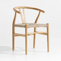 a wooden chair with a woven seat and backrest, on a white background the chair is made out of wood