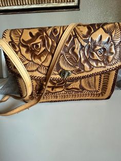 Great find. Vintage Brown Crossbody Wallet, Elegant Leather Clutch With Hand Tooled Details, Vintage Leather Crossbody Clutch, Hand Tooled Travel Clutch, Hand Tooled Leather Clutch, Elegant Hand Tooled Leather Wallets, Hand Tooled Leather Rectangular Clutch, Leather Purse, Leather Purses