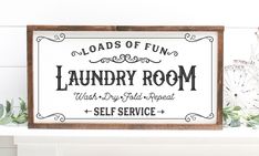 a sign that says loads of fun laundry room wash your feet, repeat self service