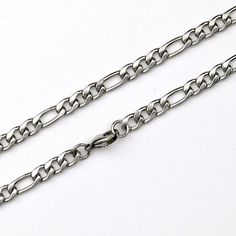 Material: polished 316 stainless steelClosure: Lobester clawChain style: FigaroLength : 19"/23"/27"Message me for wholesale price Stainless Steel Figaro Link Chain Jewelry, Stainless Steel Chain Link Necklace With Solid Construction, Silver Figaro Chain Jewelry In Stainless Steel, Silver Stainless Steel Necklace With Figaro Chain, Silver Stainless Steel Figaro Chain Necklace, Streetwear Stainless Steel Chain Necklace With Adjustable Chain, Stainless Steel Figaro Chain Necklace, Nickel-free Stainless Steel Chain Link Jewelry, Tarnish-resistant Stainless Steel Link Necklace