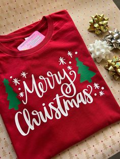 Christmas t-shirt , great for Christmas gift, family matching t-shirt, Christmas events  t-shirt : is unisex , stretch , very soft material  multiple colors available , please select one  also a variety of colors   PLEASE READ: white t-shirt will have red letters and green trees  the rest of the colors will come white as the sample with green trees   feel free to message me if you have  any questions  thank you for stopping by -----Marthalovescraft----- Affordable Customizable Christmas T-shirt, Christmas Shirts Teepublic, Christmas Tshirts Teepublic, Christmas Trees T Shirts Vinyl, Holiday Tshirts Vinyl, Cheap Christmas Holiday T-shirt, Rudolf Shirt Vinyl, Christmas Tshirts 2022, Christmas T- Shirts