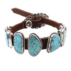 Embrace the captivating beauty of the Charles Rogers Navajo bracelet. Adorned with seven stunning turquoise stones, this piece makes a bold fashion statement. The 1/2" x 1" center stone and rich brown leather create a stunning contrast, secured with a dazzling sterling silver buckle. This bracelet can be easily adjusted to fit wrists up to 9" in circumference. The image reflects the exact product you will receive. Southwestern Brown Bracelets, Southwestern Style Brown Concho Bracelets, Southwestern Brown Jewelry With Patina, Brown Southwestern Jewelry With Patina, Western Leather Jewelry With Concho, Southwestern Style Brown Bracelet Jewelry, Southwestern Brown Leather Jewelry, Southwestern Style Brown Leather Jewelry, Southwestern Style Brown Bracelet