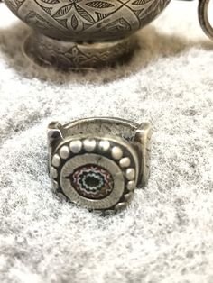 Very beautiful Tuareg/Sahrawi ring from South Morocco made out of high grade silver and ornated with a chevron bead which is said it protects from evil eye. Size : US : 10 FR : 63 Diameter of the stone : 1cm Weight : 25,3g Bohemian Engraved Toe Ring, Artisan Etched Ring Jewelry, Traditional Antique Silver Ring Jewelry, Traditional Antique Silver Ring, Bohemian Antique Silver Sterling Silver Rings, Antique Silver Bohemian Ring, Bohemian Sterling Silver Rings In Antique Silver, Unique Handmade Antique Silver Rings, Bohemian Antique Silver Ring